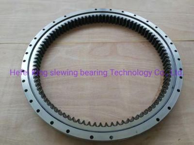 High Quality E215 Compact Design Four Point Contact Slewing Bearing 72203516